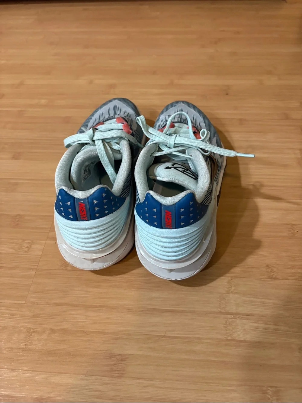 Nike Light Blue and Coral Accent Sneakers